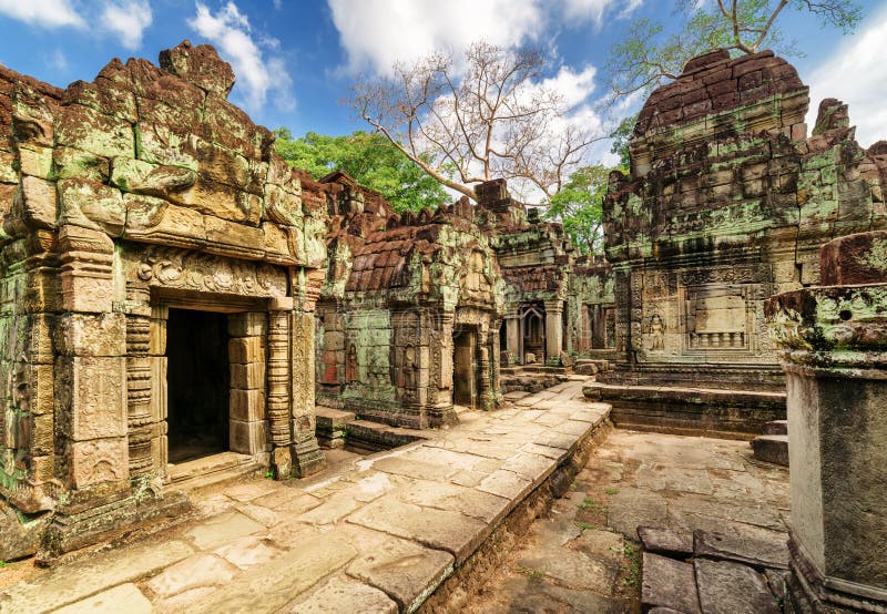 ancient-buildings-carving-preah-khan-temple-angkor-mossy-blue-sky-background-nestled-rainforest-enigmatic-57430913.jpg